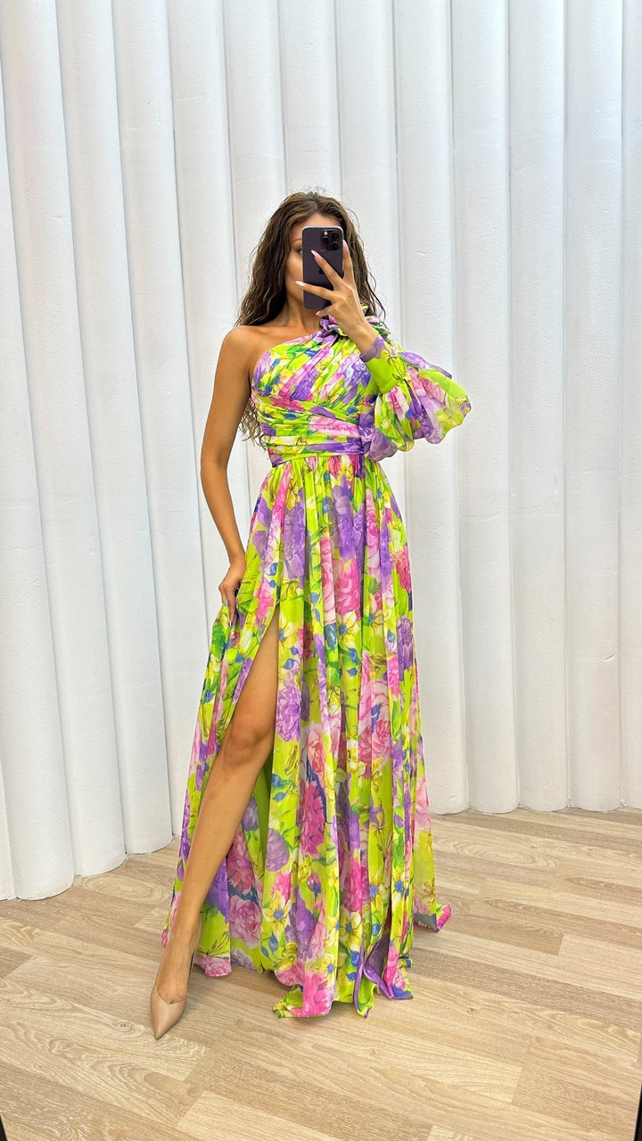 Full-length women's dress with a beautiful floral design and a chic, comfortable slit