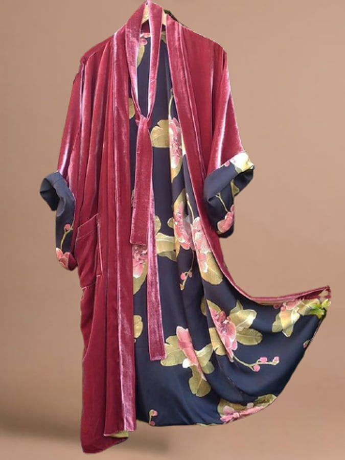Green floral print women's midi dress, designed as a cardigan with a flattering waist belt for elegance.