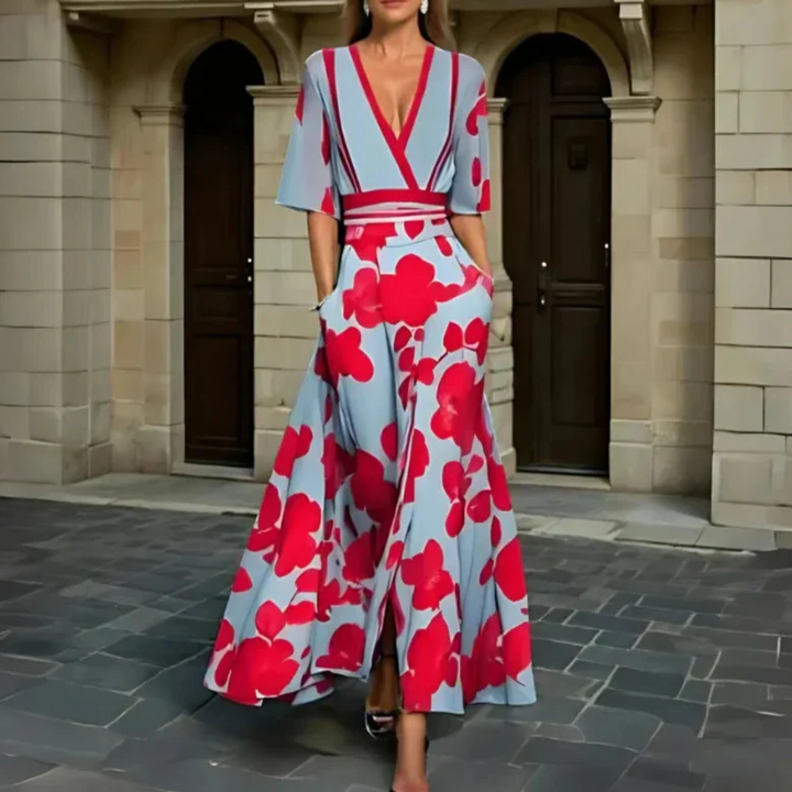 Elegant women's floral midi dress, perfect for summer. Features a beautiful print and comfortable fit for day or evening wear.