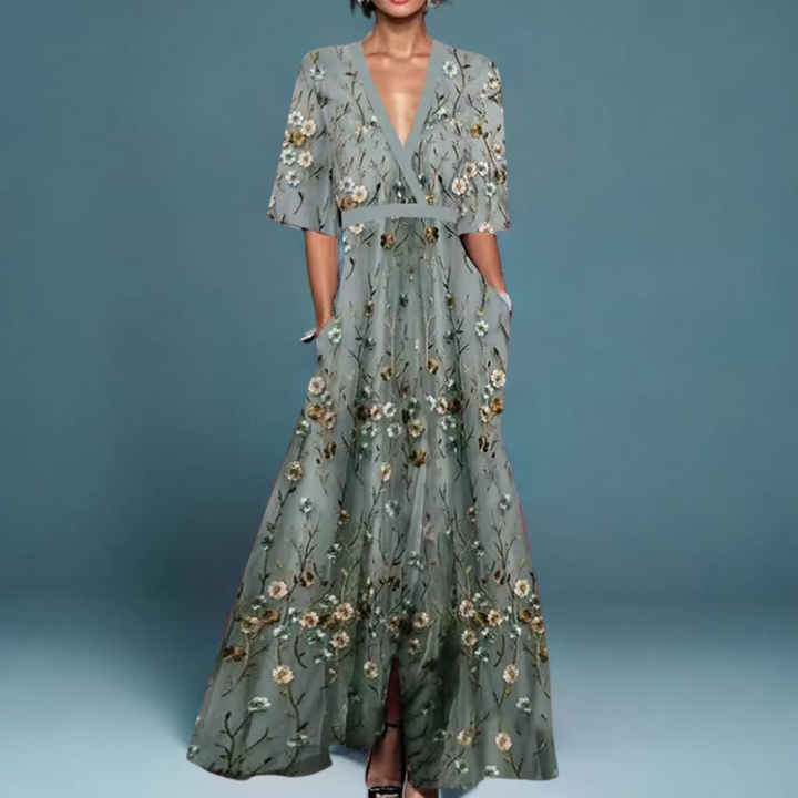 Women's elegant floral midi dress, a comfortable and versatile summer fashion piece. Perfect as a day or evening dress.