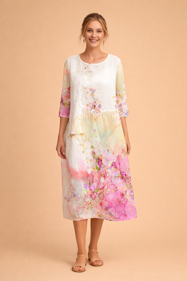 Hem detail of an elegant women's floral midi dress, showing the relaxed, airy fit ideal for summer fashion.