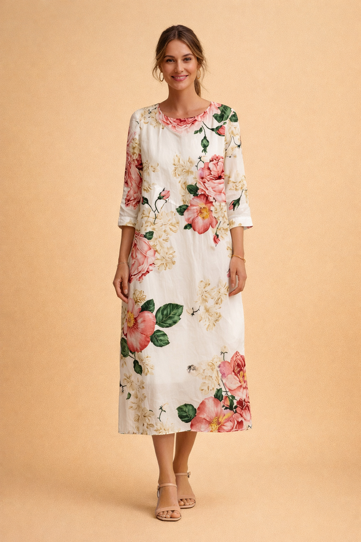 Three-quarter sleeve detail on a women's elegant floral midi dress, offering a relaxed and airy fit.