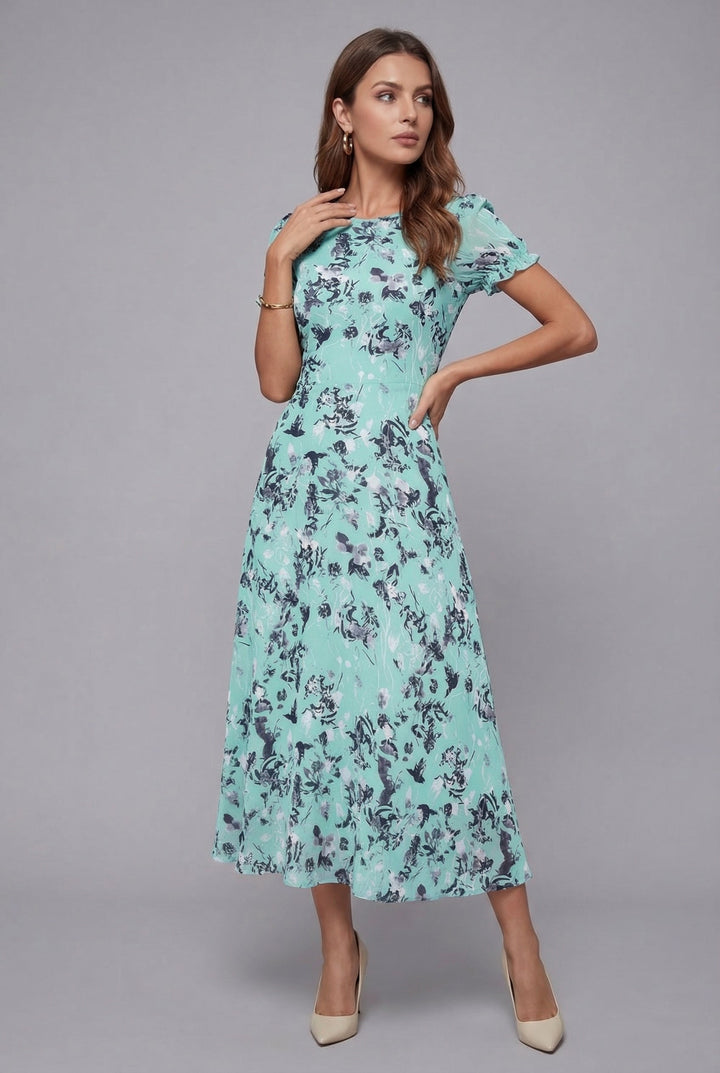 Elegant women's floral midi dress with short sleeves, versatile for summer casual or party occasions.