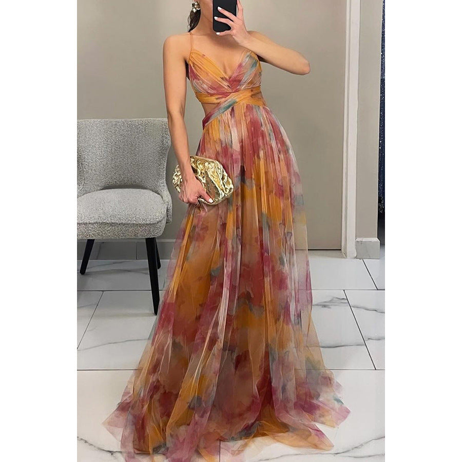 Modern elegant women's floral evening dress with spaghetti straps, perfect for contemporary formal wear.