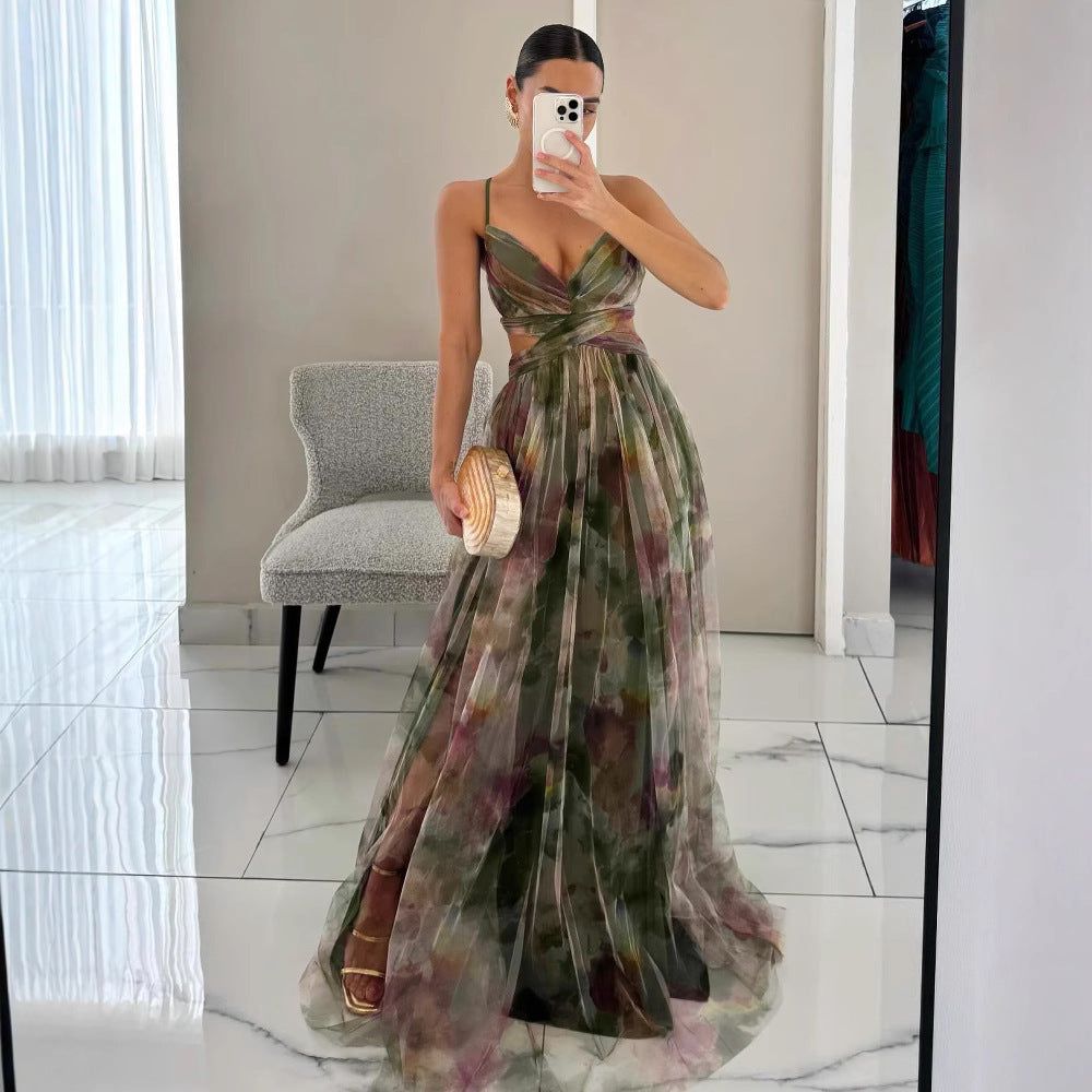 Graceful women's floral empire waist dress, featuring delicate prints, ideal for elegant evening wear.