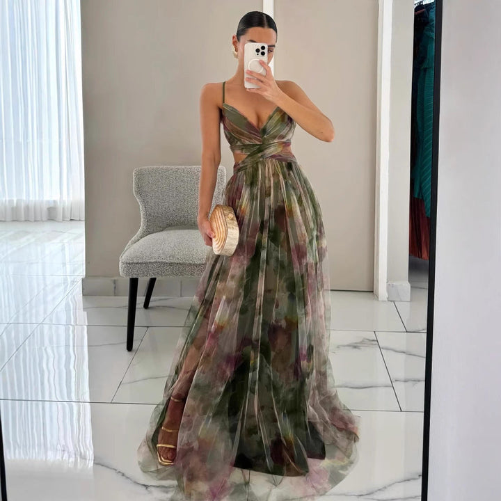 Graceful women's floral empire waist dress, featuring delicate prints, ideal for elegant evening wear.