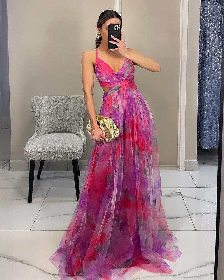 Vibrant floral print evening dress for women, an elegant and eye-catching gown for special occasions.