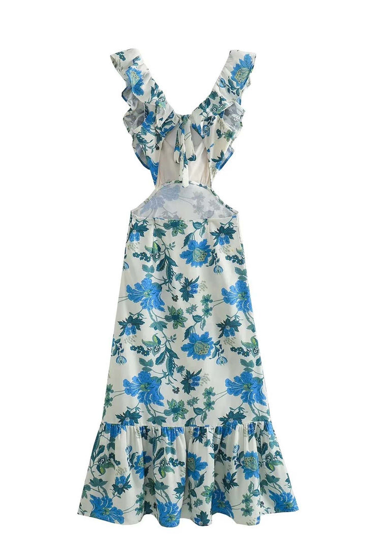 Full-length view of a women's floral long dress with graceful ruffles, embodying summer elegance.
