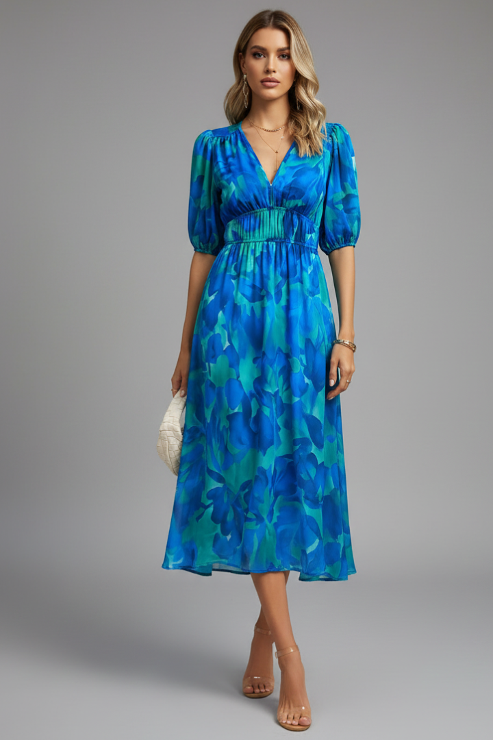 Boho chic women's midi dress with vibrant floral print and stylish puff sleeves.