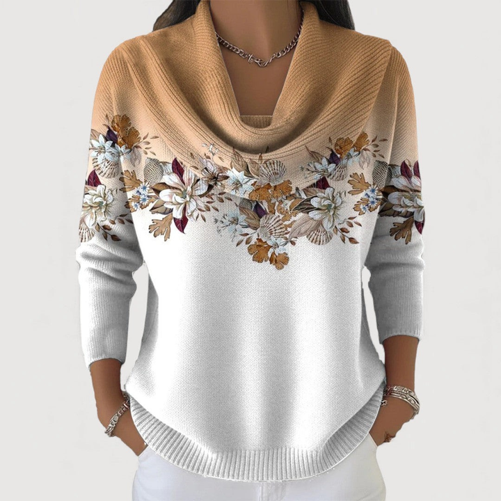 Cozy women's floral pullover sweater with long sleeves, offering soft comfort & versatile everyday fashion.