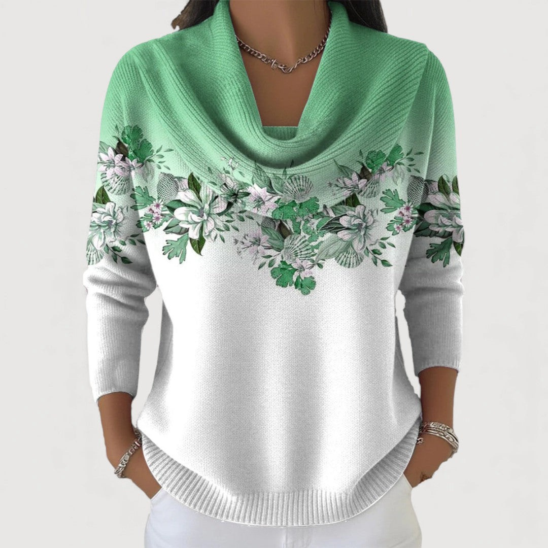 Soft women's floral pullover sweater with an elegant drape, perfect for comfortable and stylish everyday wear.