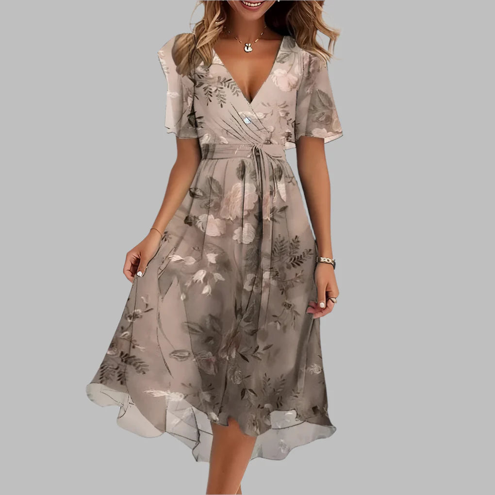 Summer-ready floral satin midi dress for women, with a sweetheart neckline and chic ruched design.