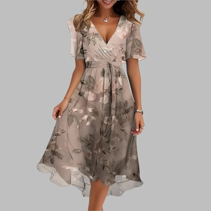 Summer-ready floral satin midi dress for women, with a sweetheart neckline and chic ruched design.