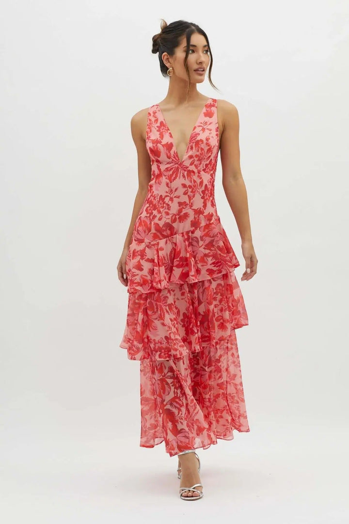Elegant women's tiered maxi dress featuring a charming floral pattern