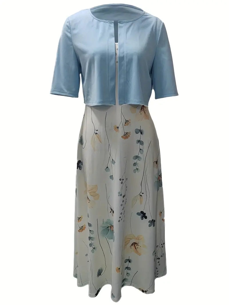 Detailed women's elegant floral two-piece set, with a stylish crop top and midi skirt for summer fashion.