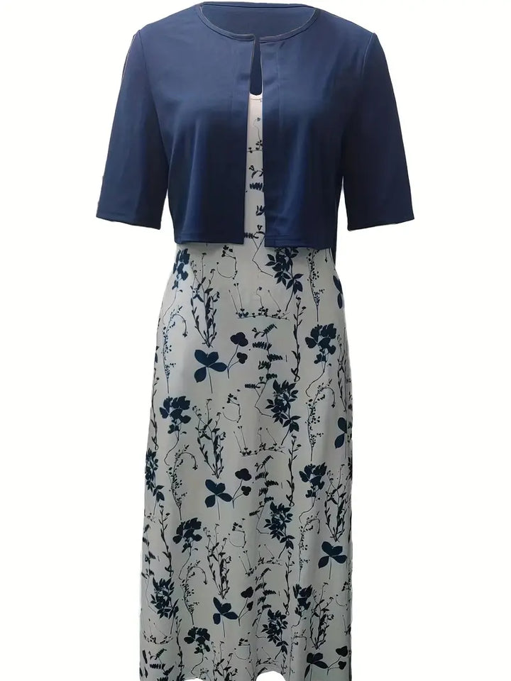 Versatile women's floral two-piece dress set; elegant crop top and midi skirt for chic summer occasions.