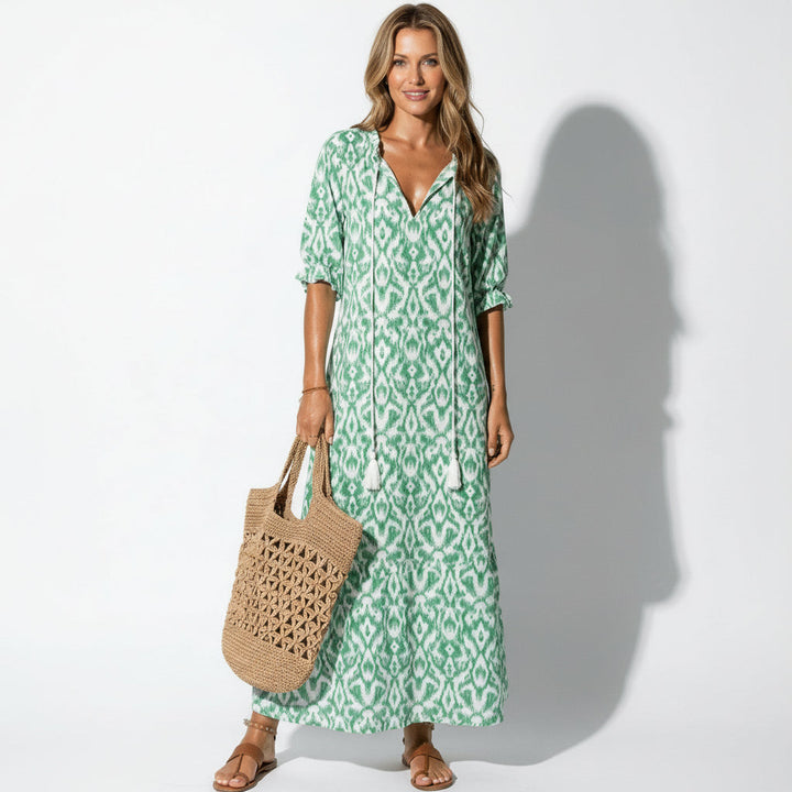 Elegant women's floral V-neck maxi dress, perfect for summer wedding guests & special occasions. Relaxed fit.