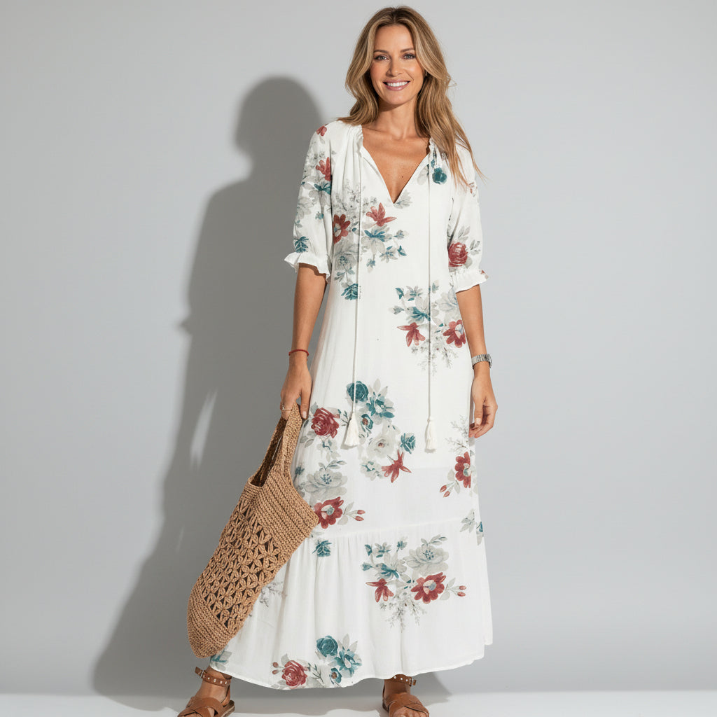 Flowing short-sleeve floral V-neck maxi dress for women, ideal for summer parties and holidays. Elegant & comfortable.