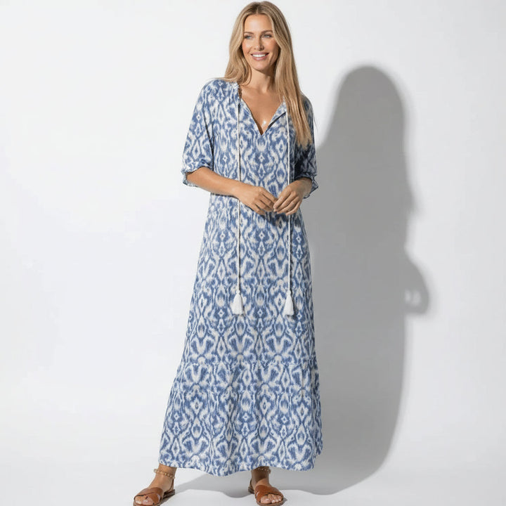 Women's elegant floral print V-neck maxi dress with short sleeves, a stylish choice for summer wedding guests.