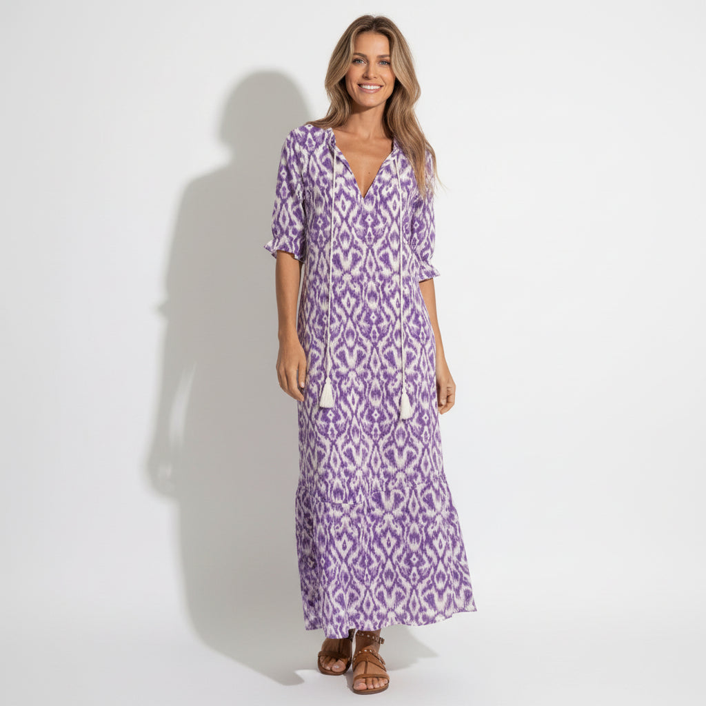 Chic women's floral V-neck maxi dress, a perfect elegant summer occasion or wedding guest outfit. Flowing style.