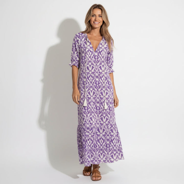 Chic women's floral V-neck maxi dress, a perfect elegant summer occasion or wedding guest outfit. Flowing style.