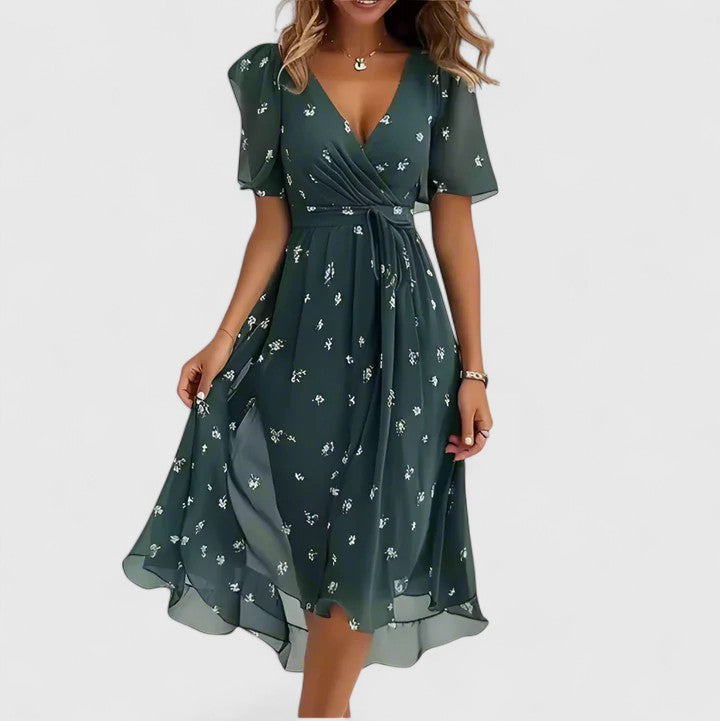 Front view of an elegant women's floral V-neck midi dress, showcasing its vibrant summer print and design.