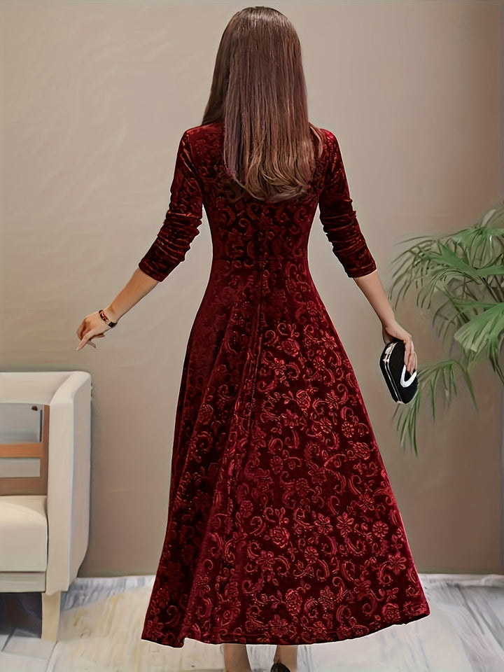 Luxurious women's velvet midi dress with floral pattern, 3/4 sleeves, perfect as an elegant cocktail dress.