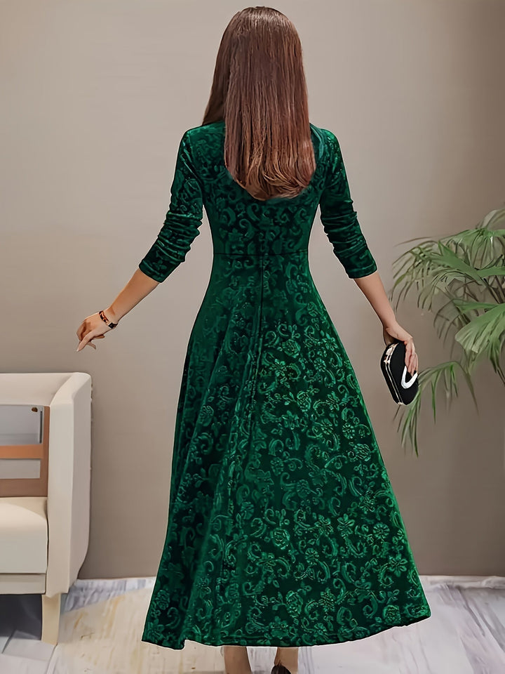 Stunning women's floral velvet midi dress, 3/4 sleeves, designed for sophisticated special occasion dressing.
