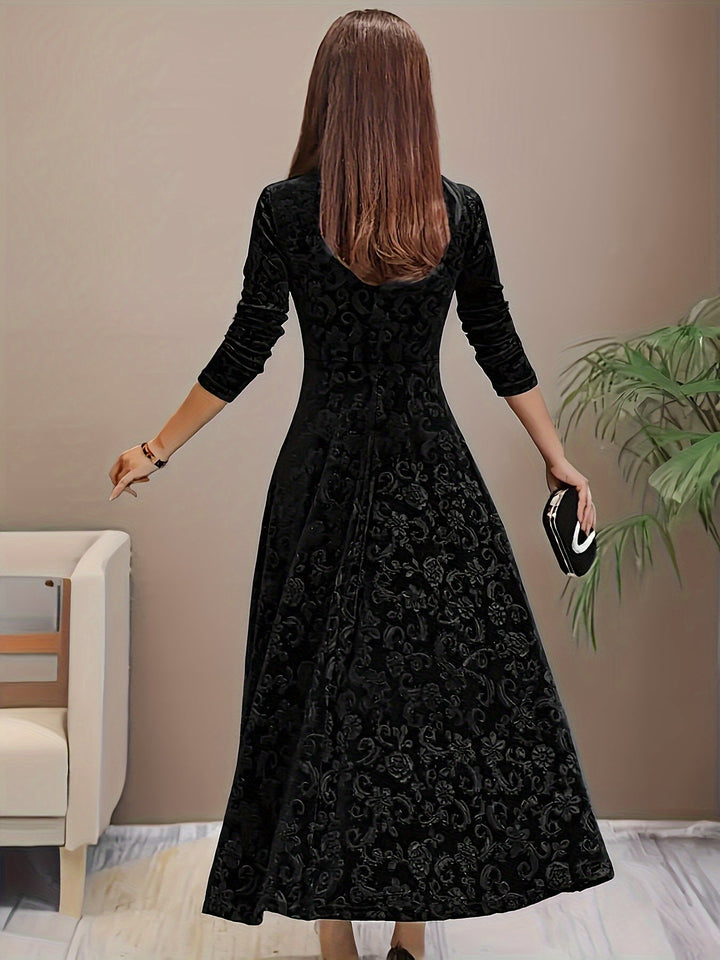 Fashionable women's floral velvet midi dress featuring 3/4 sleeves, ideal for upscale evening events.