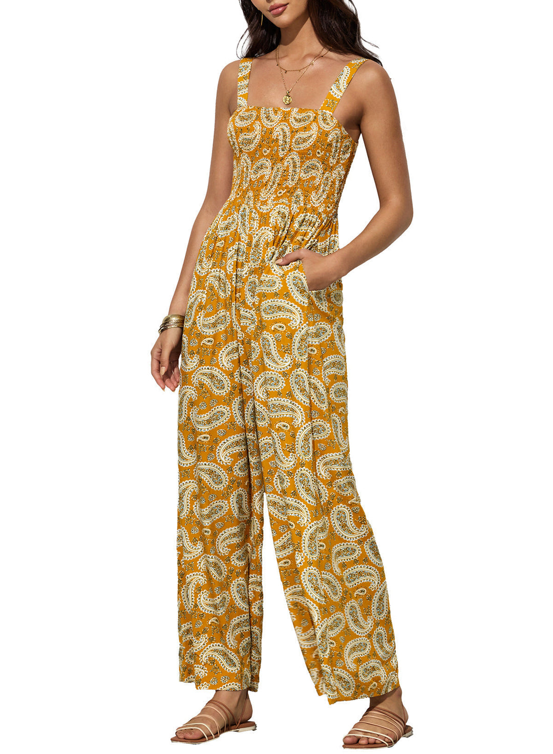 Stylish women's wide-leg jumpsuit with a beautiful floral print, great for spring outfits.