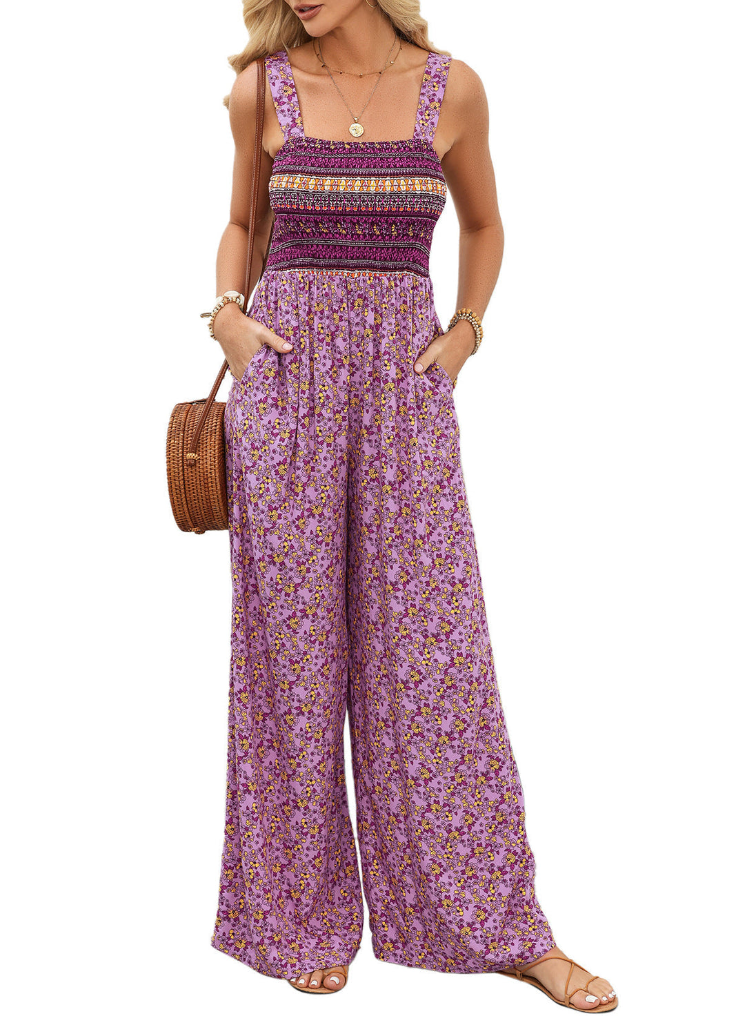 Elegant women's spring jumpsuit featuring a vibrant floral pattern and wide legs.