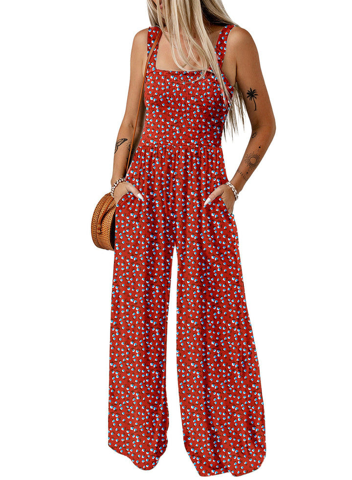 Stylish women's wide-leg jumpsuit featuring a vibrant floral print, suitable for spring.