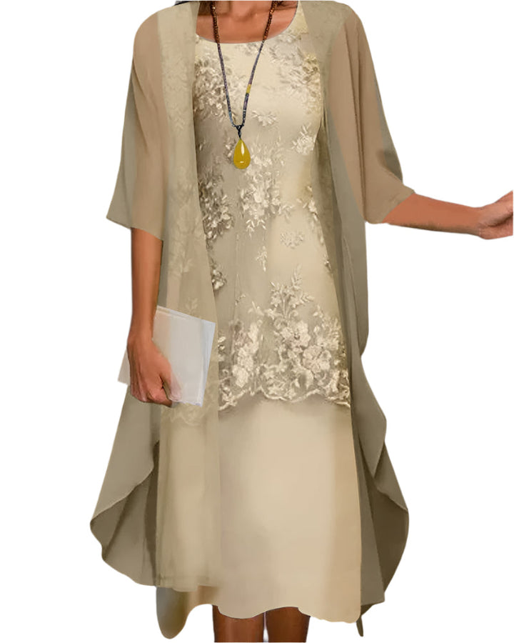 Women's glamorous midi dress with sheer sleeves and flowing skirt, ideal for summer parties and events