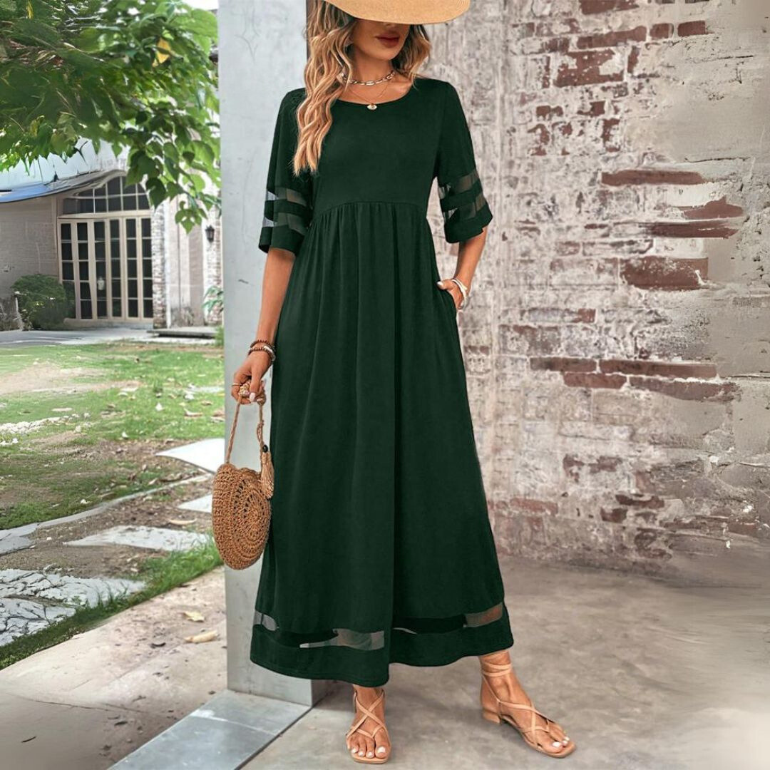 Flowy maxi dress for women, designed with an empire waist for an elegant fit.