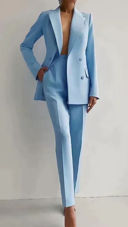 Elegant women's formal suit set with long blazer and slim fit trousers for professional attire.