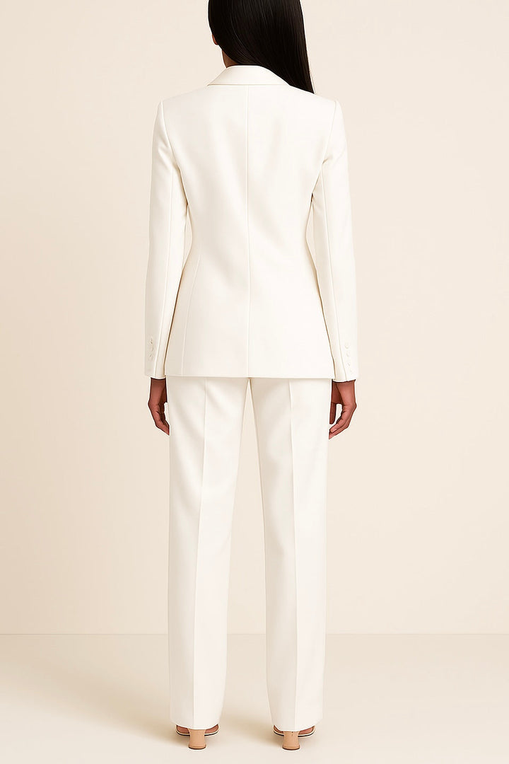 Sophisticated women's two-piece formal suit set with a long elegant blazer and slim trousers.
