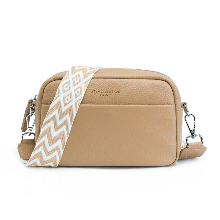 Stylish women's genuine leather handbag, convertible as a crossbody or shoulder bag, ideal for fashion.