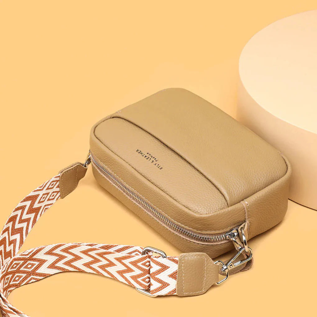 Classic genuine leather women's handbag, an elegant and versatile accessory for the modern woman.