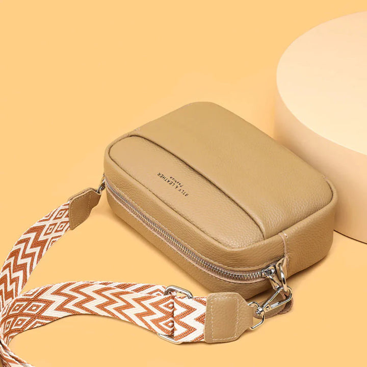 Classic genuine leather women's handbag, an elegant and versatile accessory for the modern woman.
