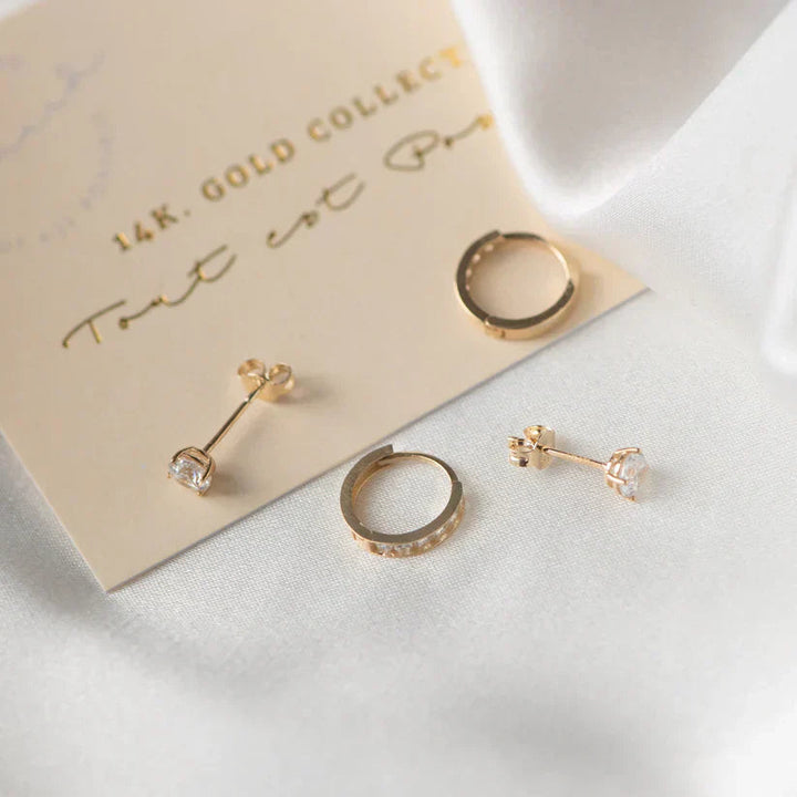 Rose gold women's earrings with brilliant sparkling stones, an elegant gift idea.