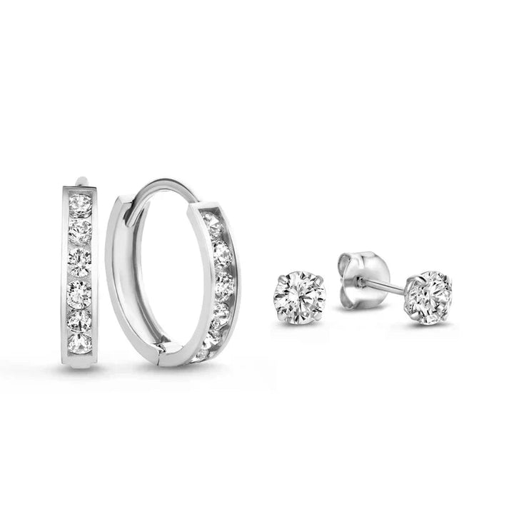 Close-up of sparkling stones in elegant gold women's earrings, beautiful jewelry.