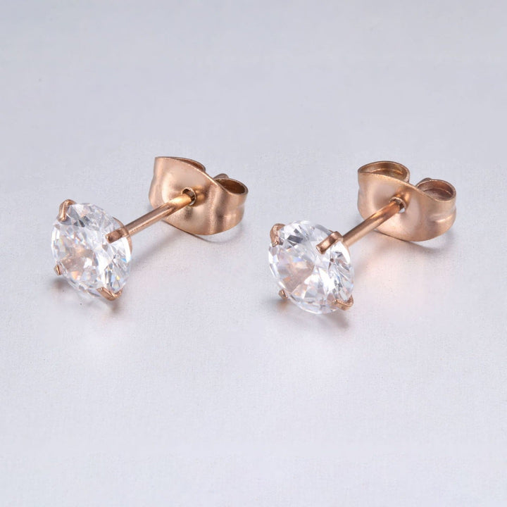 Versatile elegant women's gold earrings with sparkling stones, perfect jewelry for any event.