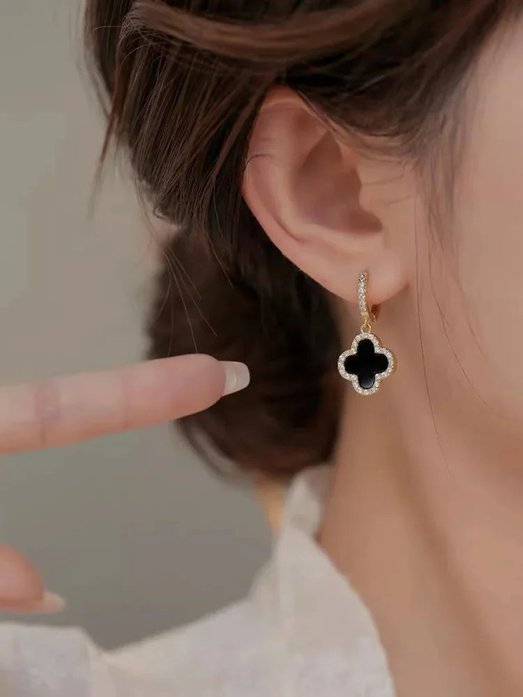 Lucky clover leaf crystal earrings for women. Gold-plated, elegant, and a timeless symbol of good fortune.