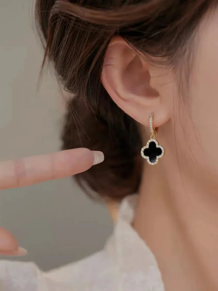 Lucky clover leaf crystal earrings for women. Gold-plated, elegant, and a timeless symbol of good fortune.