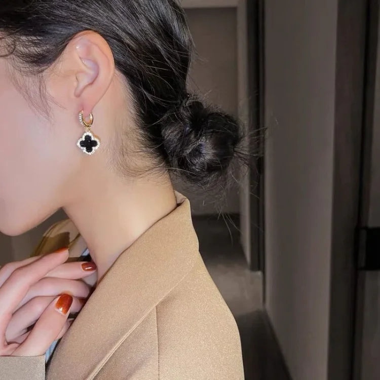 Timeless women's lucky clover leaf earrings. Gold-plated & crystal design for an elegant touch, ideal for any occasion.