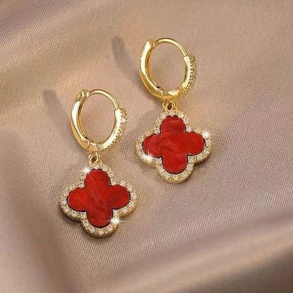 Stylish women's lucky clover leaf earrings. Gold-plated, crystal-embellished, an elegant & symbolic everyday accessory.