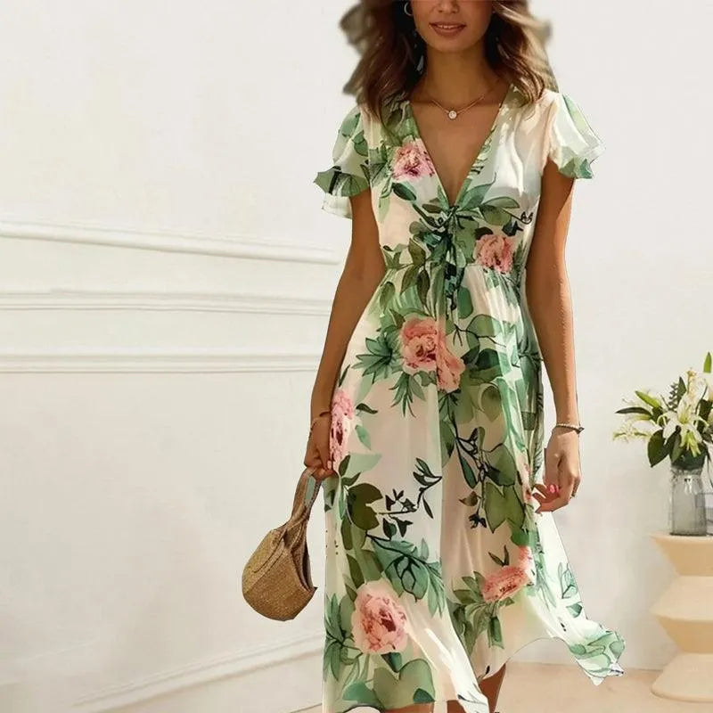 Bohemian green floral midi dress for women featuring a flowy A-line skirt, V-neck, and stylish flutter sleeves.