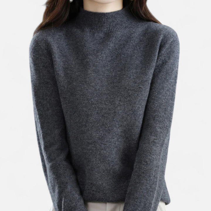Elegant women's half-neck pullover sweater. Cozy long-sleeve knit top, perfect for autumn & winter fashion.