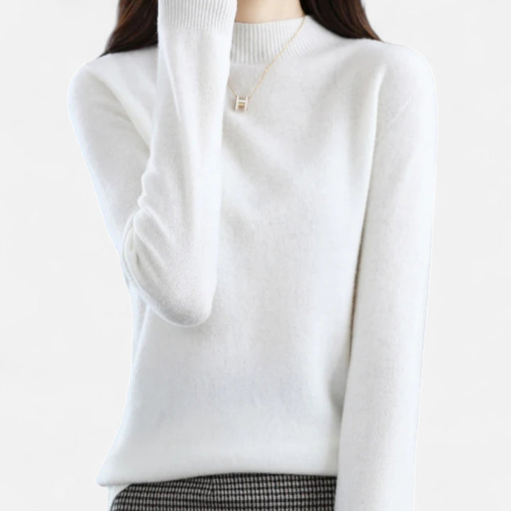 Chic half-neck women's sweater, an elegant knit top. Perfect for versatile wear & sophisticated autumn style.