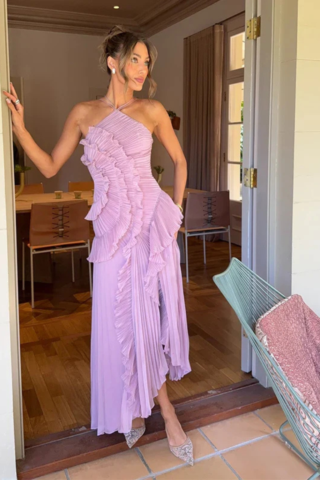 Flowy women's halter backless ruffled maxi dress, comfortable and elegant for any summer event.